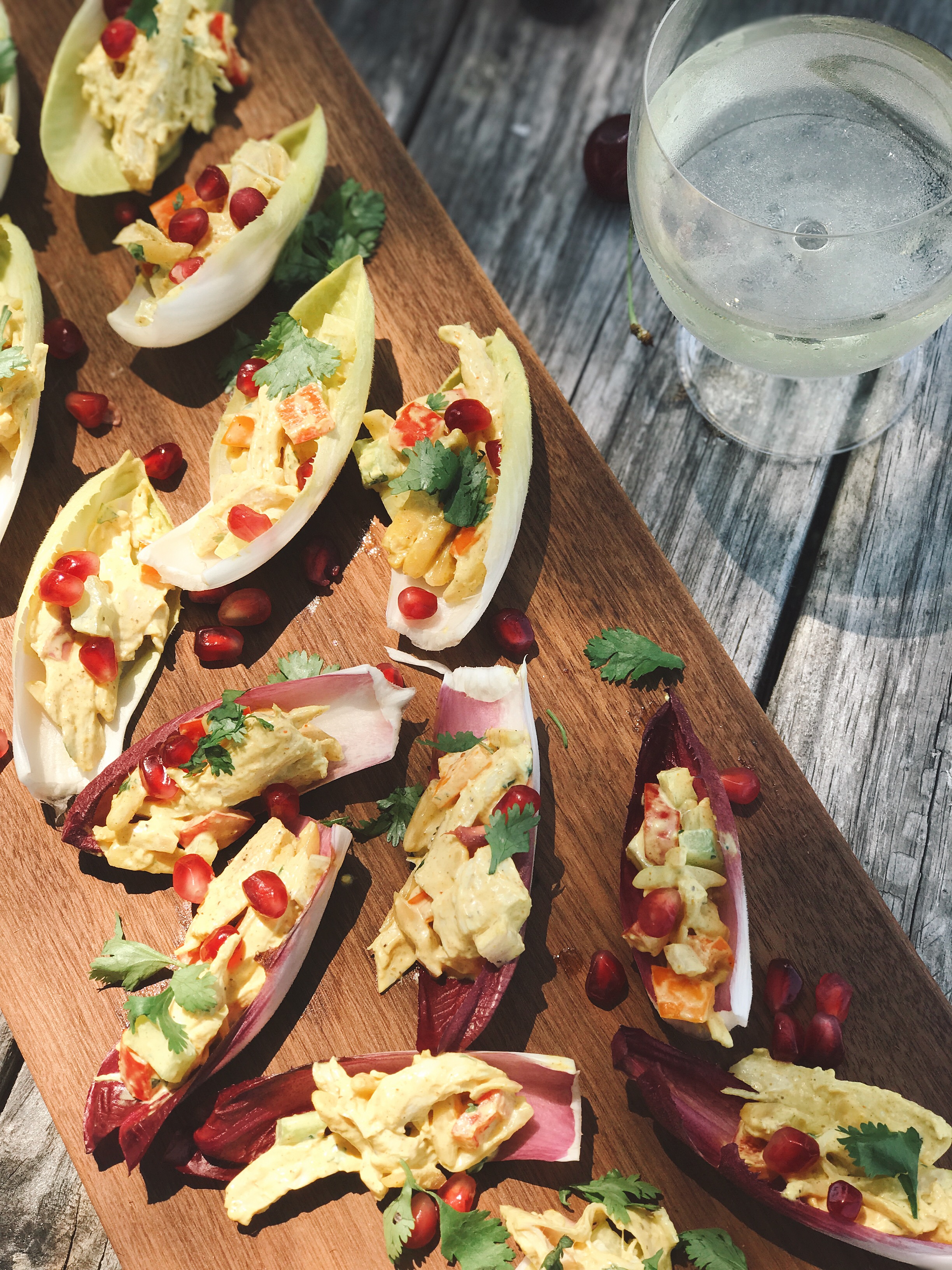 CURRIED CHICKEN SALAD BOATS WITH POMEGRANATE SEEDS // laurenariza.com